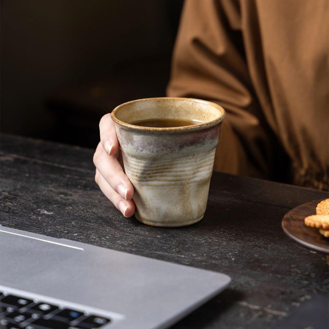 Using a coarse pottery kiln transformation process, the glaze is naturally diffused, presenting a gradient of off-white...