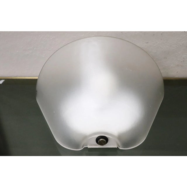 Nice Italian design sconce by VeArt, in Murano glass and golden brass. Perfect condition and fully functional. This piece...