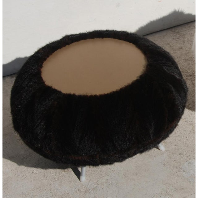 Restored faux fur table stool ottoman with aluminum legs by Allermuir. Reupholstered in a faux mink with a solid top that...