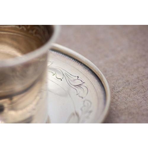 Silver Cup and Saucer with Spoon, in Very Good conditions. Designed 1980 to 1989 This piece has an attribution mark, I am...
