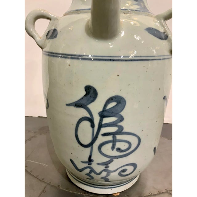 Timeless Asian Style White and Blue Glaze Porcelain Prosperity Oil Pot, showroom floor sample