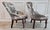 A striking matched pair of antique Victorian parlor/slipper chairs dating to approximately the turn of the 20th century,...