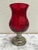 Ruby red vintage hurricane glass vessel for a candle or a vase. Textured cut glass on a silver etched pedestal base....