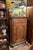 Imported from Belgium. Oak jelly cabinet. Louis XIV style with carved raised panel door.and corners. Single drawer and...