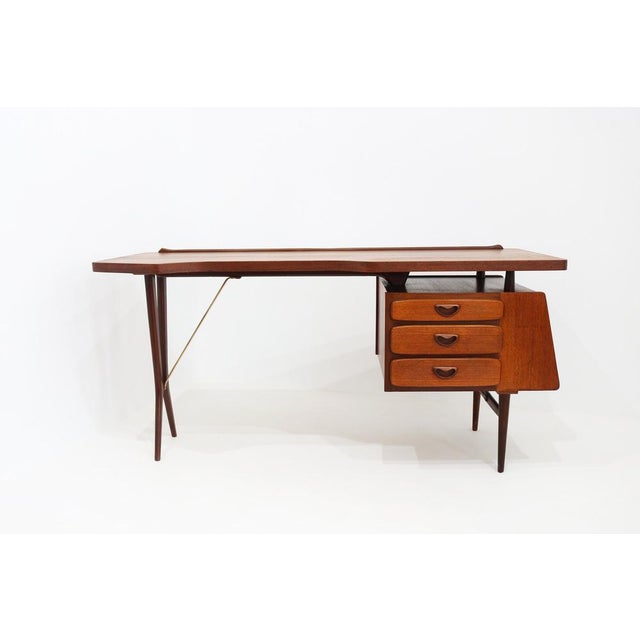 Rare and magnificent desk designed by Louis Van Teeffelen for Webe in 1952. This is one of Louis van Teeffelen’s earliest...
