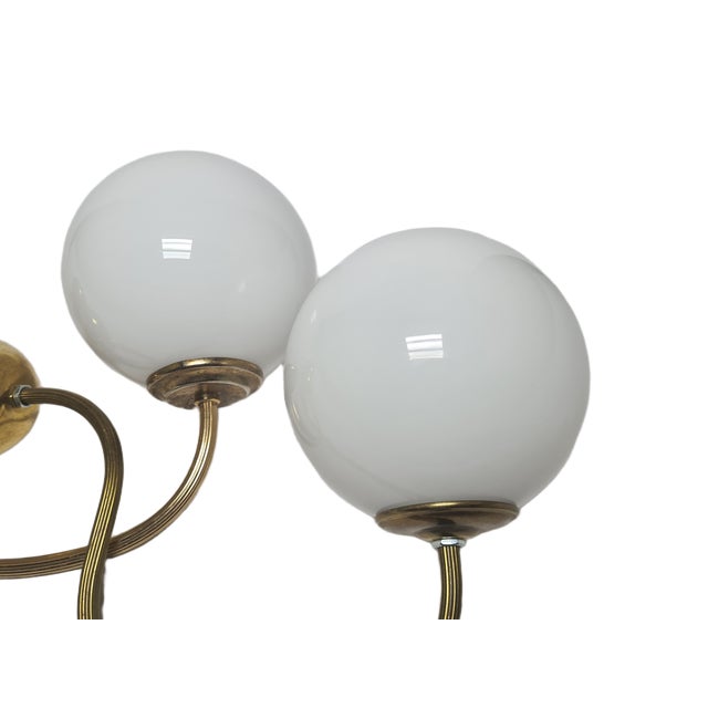 A pair of wall lamps come from the 1950s. They are in good condition. European Plug (up to 250V).The wiring of this item...