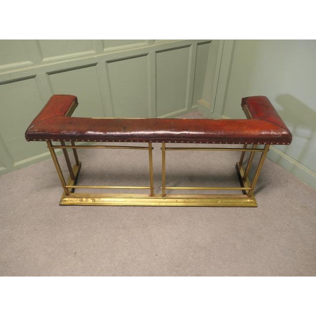 Brass and Red Leather Club Fender This is a genuine piece of Country House Decorative Furnishing the fender is in brass...