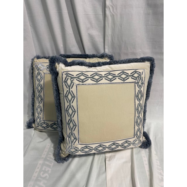 2 Cream Velvet pillows with light blue printed border (kind of grecian inspired) and a beautiful blue fringe border....