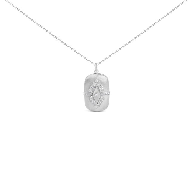 A luminous keepsake that feels both modern and timeless, this puffed medallion is sculpted in solid .925 sterling silver...