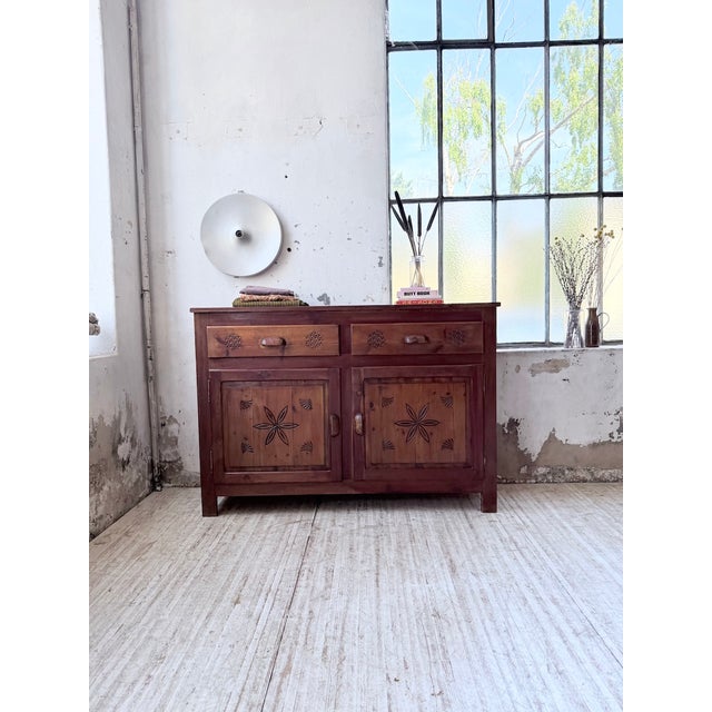Vintage pitch pine storage unit from the 1950s. this large, wide piece, reminiscent of a jam cupboard, is a product of...