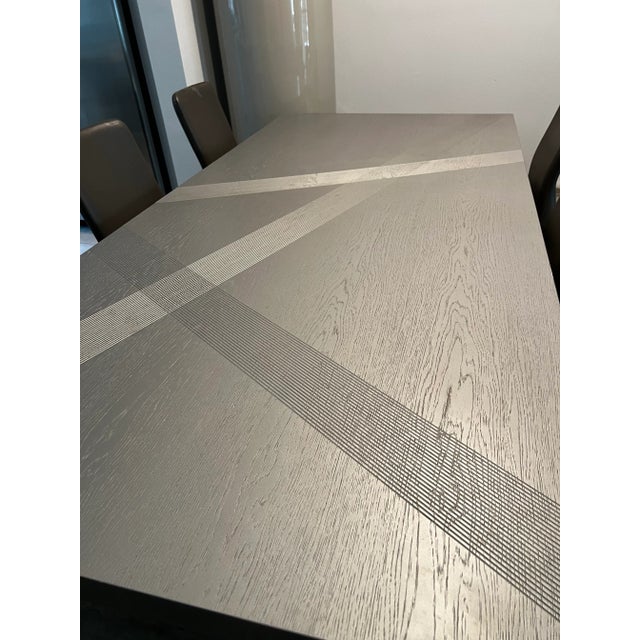 Roche Bobois Trak Dining Table With BuiltIn Extension Chairish