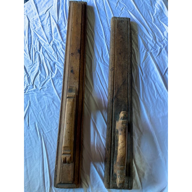 Two exquisite antique teakwood concrete floats originating from the Mediterranean region of Spain. These historic tools...