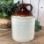 Vintage two toned Whiskey Stoneware Jug. This jug has been loved and used, it has lots of character. There are chips but...