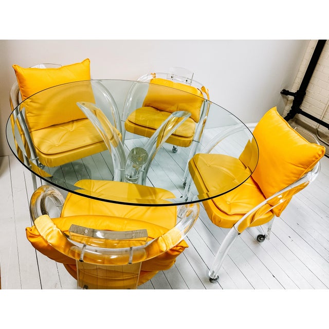 Vintage 1970’s postmodern Charles Hollis Jones style lucite breakfast or game table with 4 rolling chairs. Glass measures...
