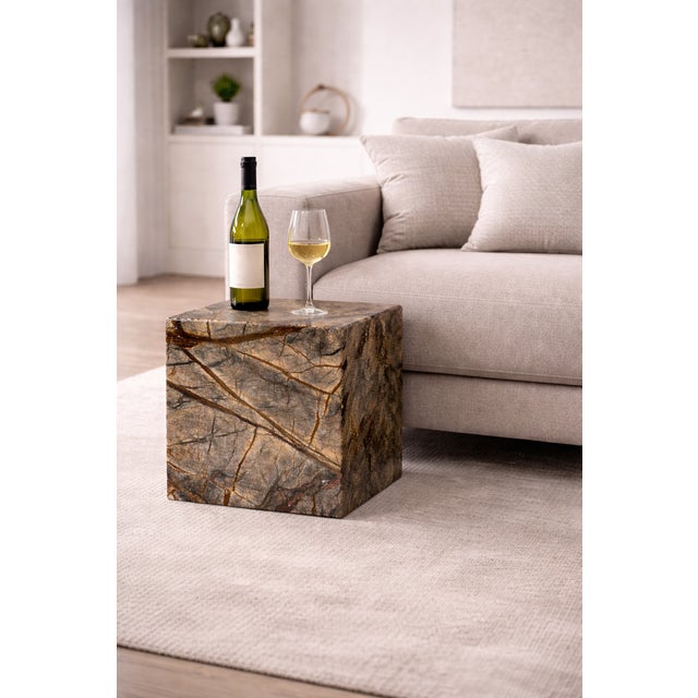 This 40x40x40 cm Forest Brown marble cube is a true sculptural piece, designed to elevate any space with a refined and...