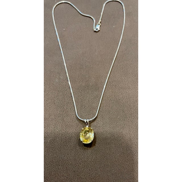 This Yellow Sapphire has Two certificates ne from GIA One from Continental Gemological Laborartory Canada Limited GIA...