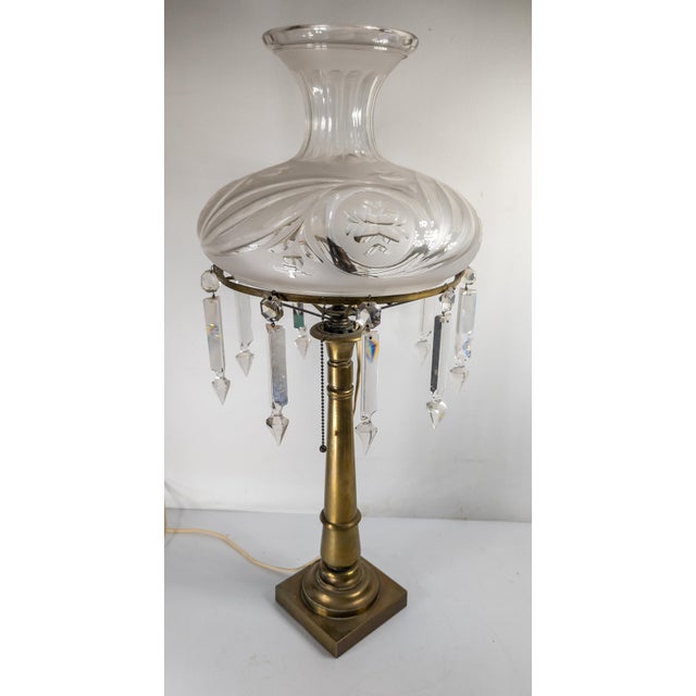 We are selling this nice 19th Century American Brass Astral Lamp. This lamp has nice simple and elegant brass base with a...