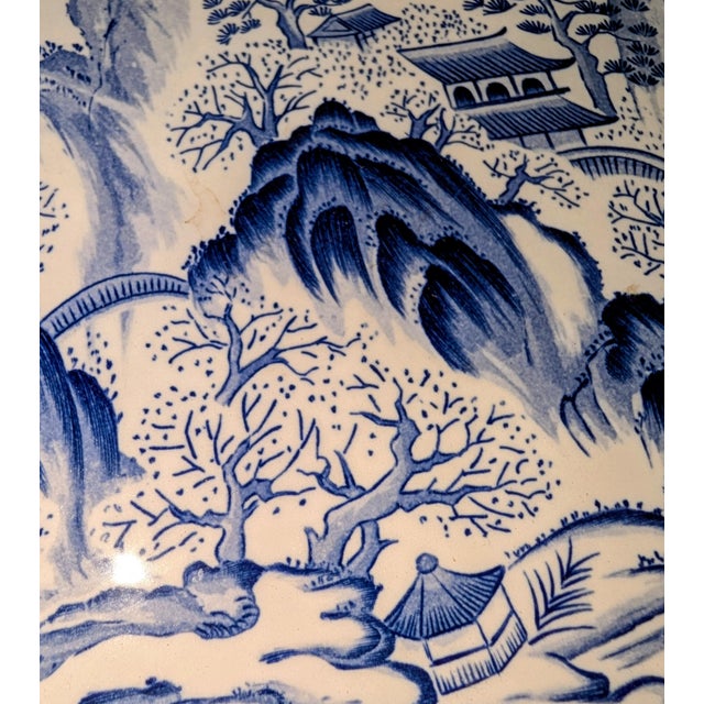 An impressive 14.5 inch Japanese underglaze Sometsuke (blue and white) porcelain charger featuring an intricate...