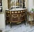Bring timeless French elegance into your home with this magnificent Louis XVI-style demilune sideboard cabinet. Crafted...