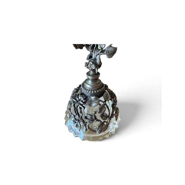 Beautiful decorative Matson Ormolu perfume bottle featuring clear glass surrounded by exceptionally detailed openwork...