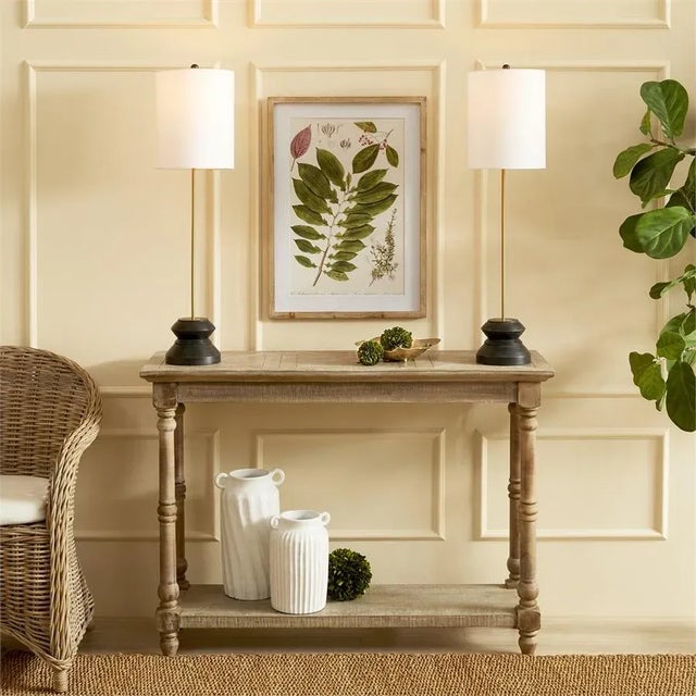 The Kaiden Gold & Black Lamp With a tall, narrow profile and geometric turned wood black wash base, this lamp is perfect...