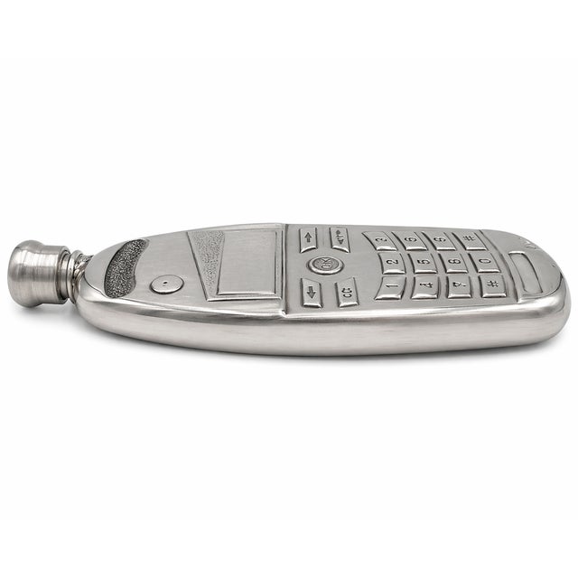 Details: -Vintage novelty flask in the shape of a cell phone. -Top of flask has screw top to fill with desired liquid...