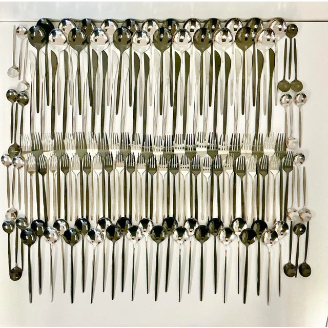 This stunning mix of Black and Silver toned flatware was used once for a "white dinner party." It was lovely with white...