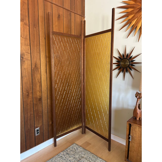 Mid century amber acrylic diamond 2 panel screen. This screen can be used as freestanding or with tension springs added to...