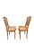 This set of two solid wood frame accent chairs features beautifully curved cabriole legs, hand-carved frames, and woven...