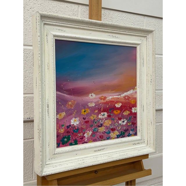 Multi Coloured Wild Flowers on a Turquoise & Pink Background by Contemporary Artist, Angela Wakefield. This is a dreamy...