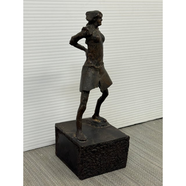 Design Plus Gallery presents a Late 20th Century Female Bronze Figure Sculpture. The sculpture has plinth base that is...