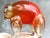 A rare and visually striking Murano-style glass bear sculpture in glowing amber and ruby red tones. Heavy hand-blown art...