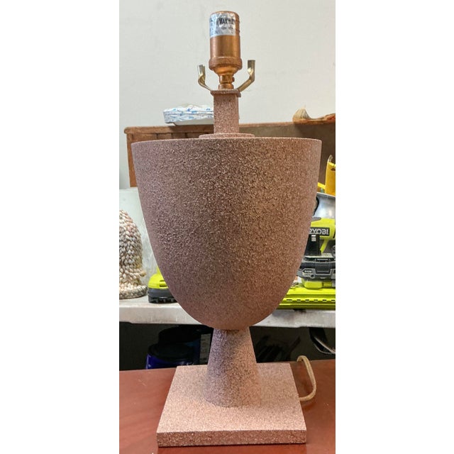 This is a pair of organic modern crushed shell encrusted metal lamps attributed to Currey & Co. They are sort of a blush...