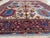 This vintage rug was hand-knotted in wool, woven in Afghanistan in the Kazak Caucasian tribal design tradition. Measuring...