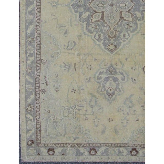Turkish Vintage Turkish Medallion Oushak in Muted Yellow, Blue, Green, Peach & Lilac For Sale - Image 3 of 9