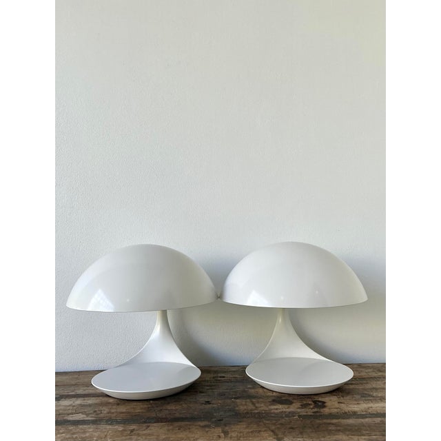 This iconic pair of “Cobra” table lamps, designed by Elio Martinelli for Martinelli Luce in 1968, is a masterclass in...