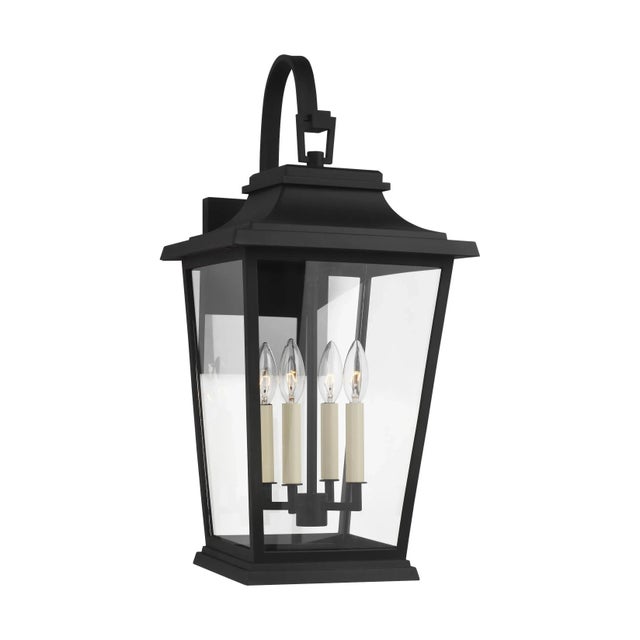 The Warren four light outdoor wall fixture in textured black creates a warm and inviting welcome presentation for your...