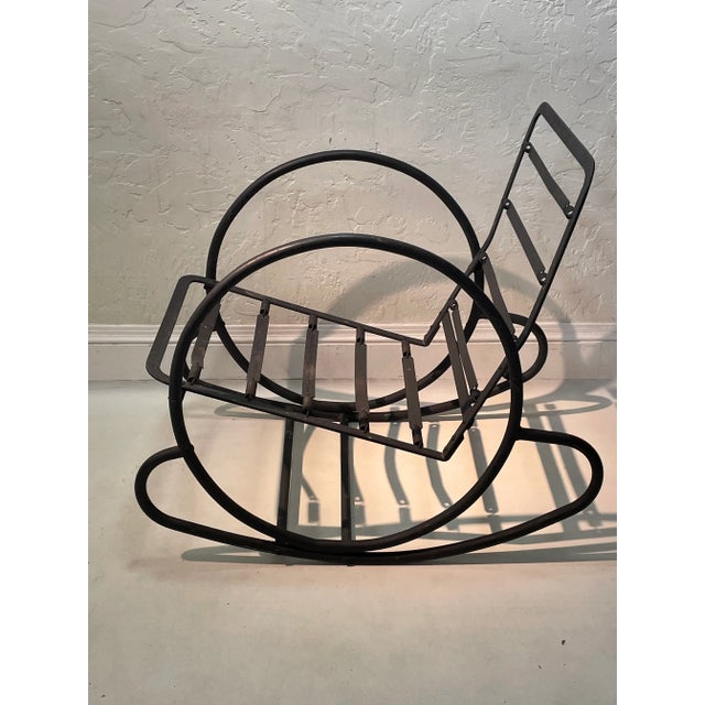 Gorgeous pair of American Art Deco streamlined design tubular steel “Hoop” rocking chairs, strong and sturdy, rocking very...