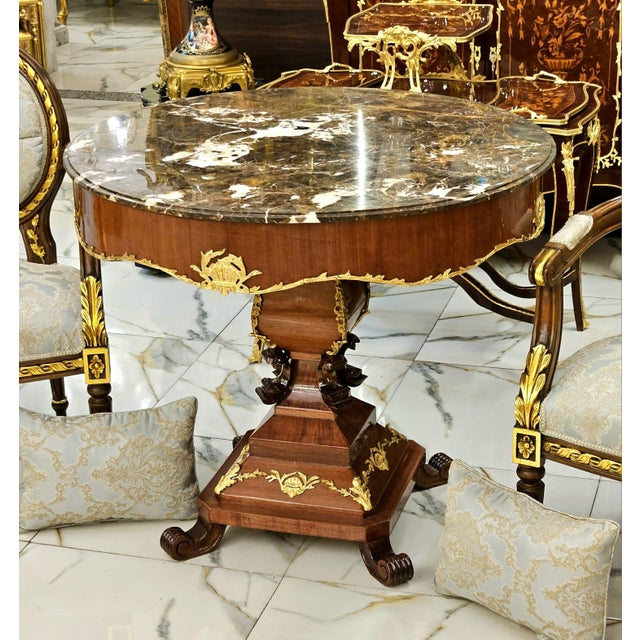 Make a statement in your living room with this breathtaking luxury round center table, masterfully crafted from premium...