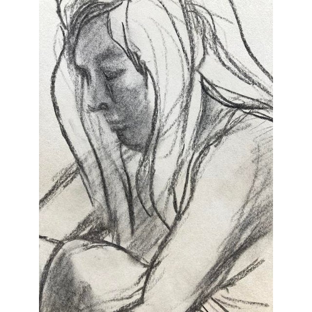 Large charcoal figure drawn from life on 18" x 24" off white newsprint. Subtle tones of black, white and grey. Would look...