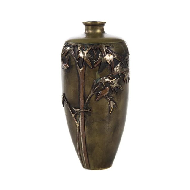 Offering a 19th century Japanese mixed metal Meiji vase. A beautiful piece that will add to your décor! size 3 x 6"
