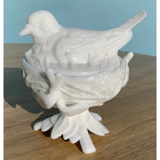 1970s vintage milk glass lidded vessel. With dove bird lid resting on tree branch nest vase.
