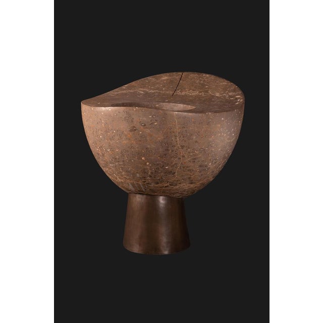 Baptis silvestrin freestanding basin in jurassic fossil stone by nerinea. Dimensions: ø 96 x h 103 cm. Materials: natural...