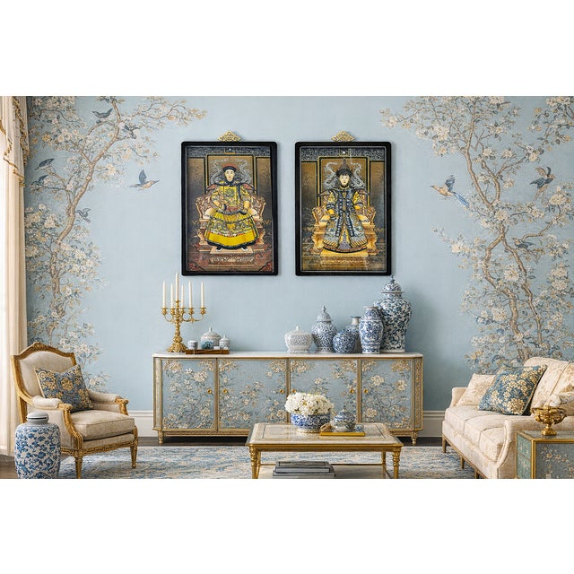 Offering a pair of reverse hand painted on glass of Chinese Emperor and Empress portrait paintings, circa 1940s. These...