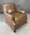 This new showroom sample Alden Parks modern leather club chair is upholstered in rich brown leather with button tufting...