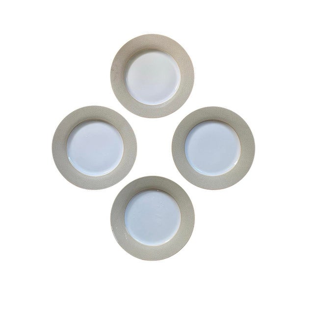 Wonderful set of 4 contemporary plates by Godinger (known for their silver plate items), presented in a lattice pattern...