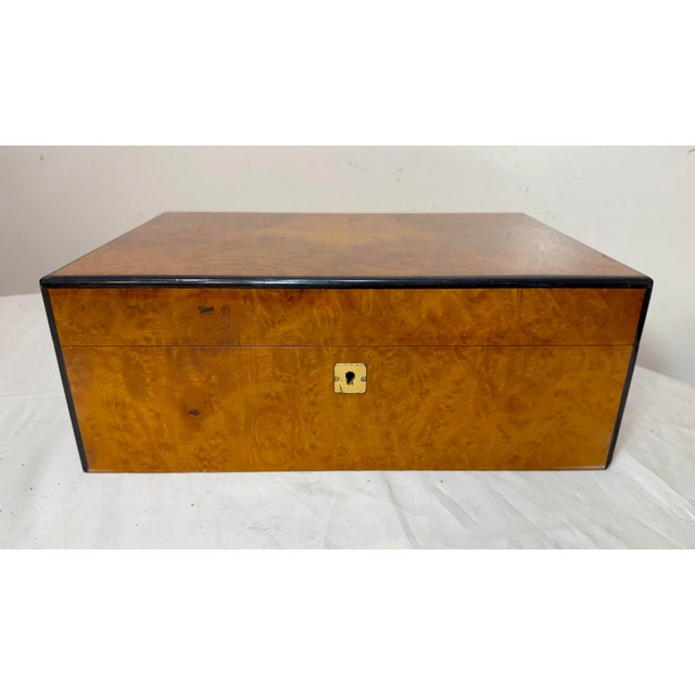 This exquisitely made Caminetto Italian humidor box is a luxurious and unique piece crafted with high-quality materials....