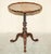 Fine antique pie crust edge tripod table after the original by Gillow's of Lancaster with flamed mahogany top A very good...