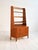 Teak bookcase with three drawers and open shelves. Integrated contoured handles. Made by Förenade Möbelfabrikerna,...