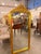 A spectacular oversized French Louis XV-style floor mirror, designed to bring the dramatic elegance of a grand European...